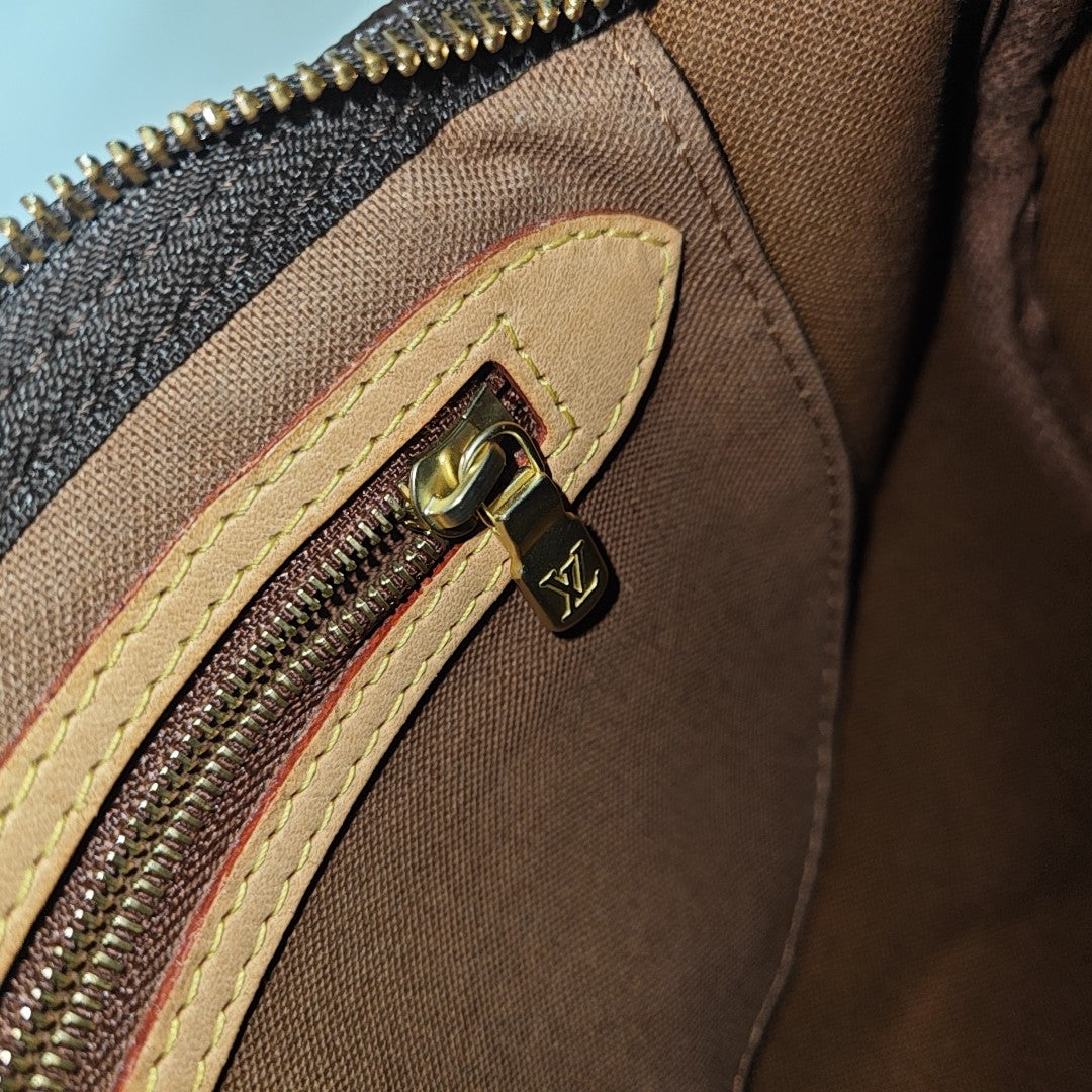 SPEEDY 25 Monogram Coated Canvas Brown