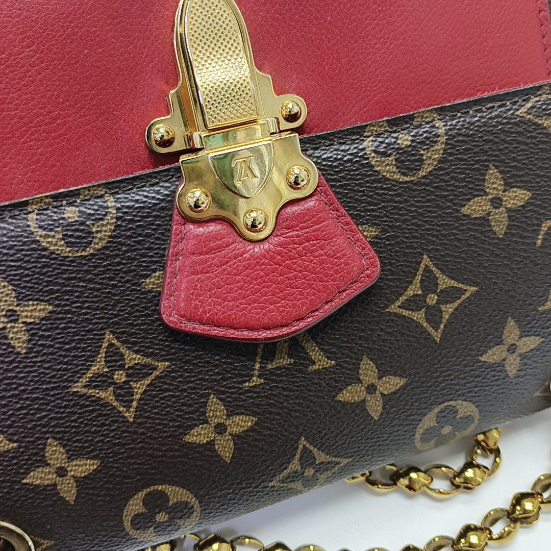 VICTOIRE Monogram Coated Canvas Brown