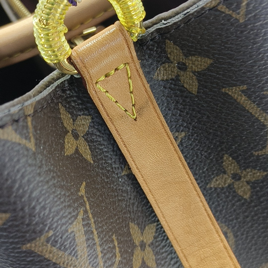 MONTAIGNE Monogram Coated Canvas Brown