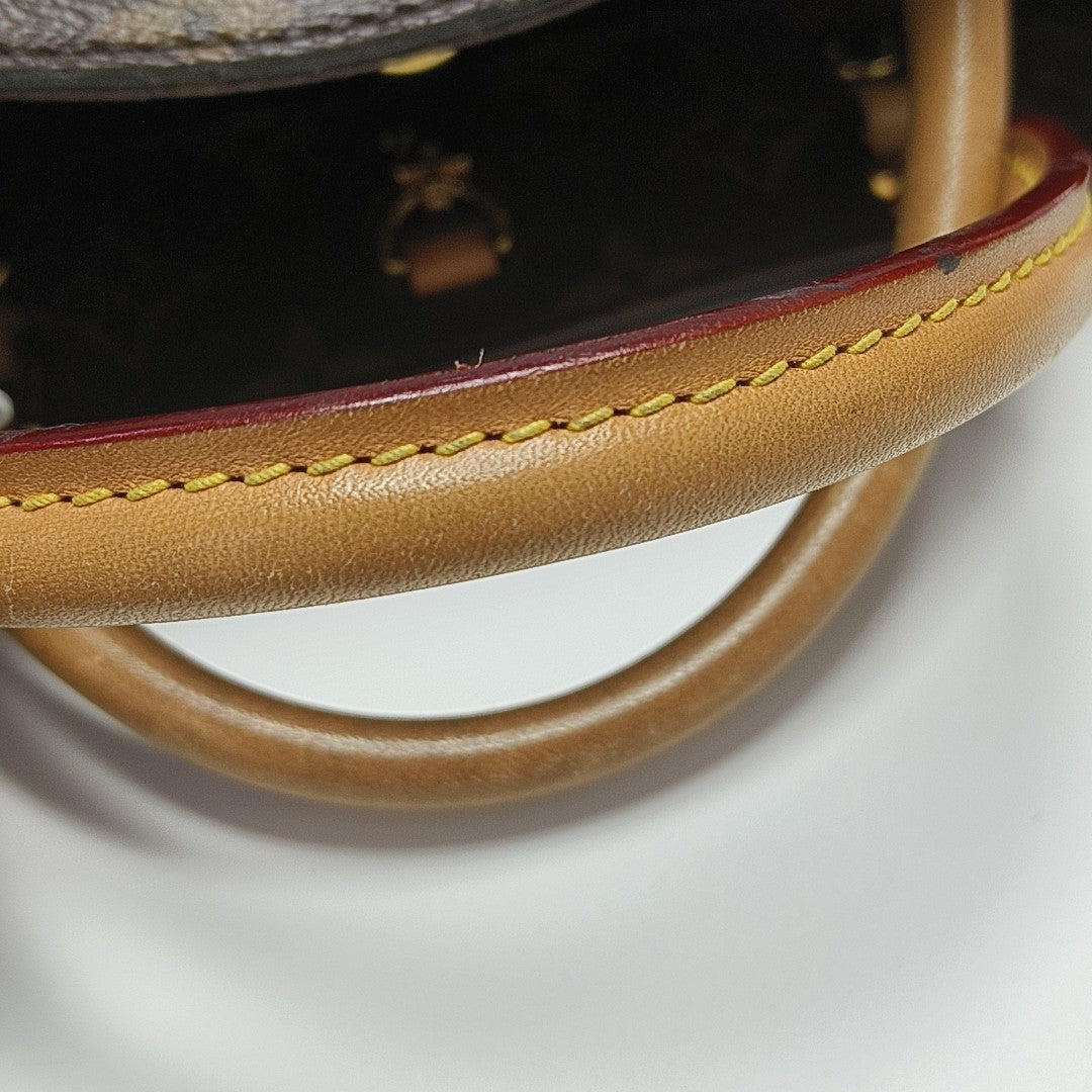 MONTAIGNE Monogram Coated Canvas Brown