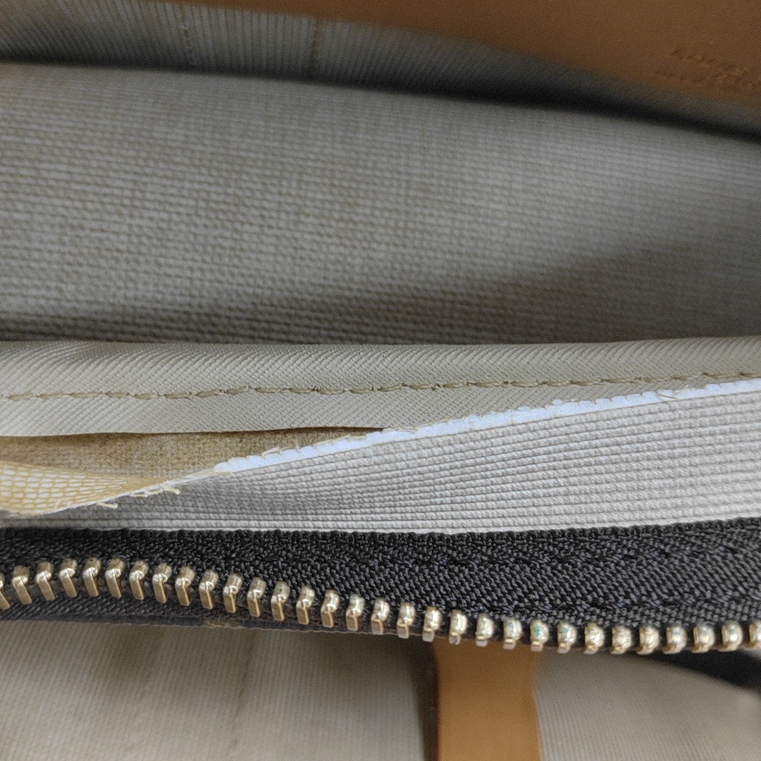 SIRIUS Monogram Coated Canvas Brown