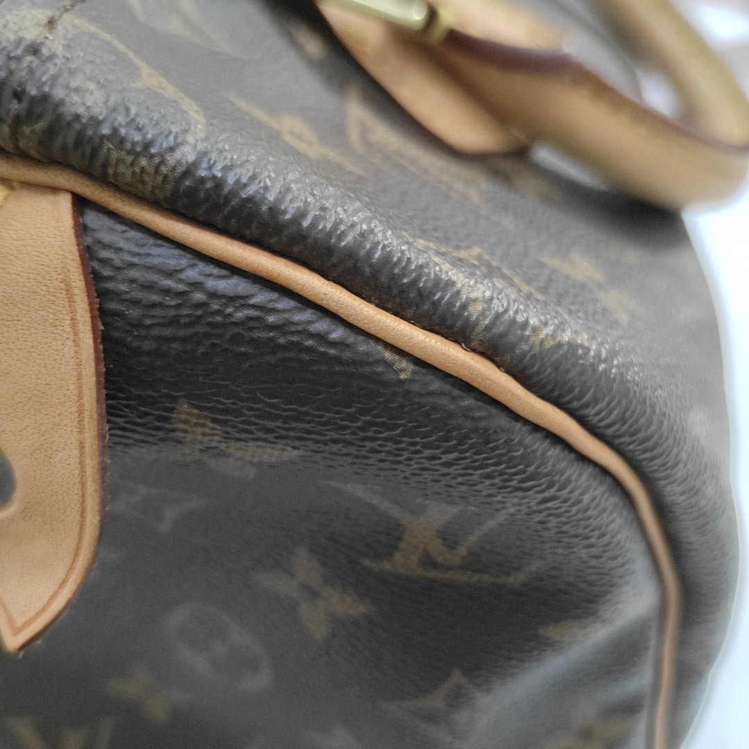 SPEEDY 25 Monogram Coated Canvas Brown