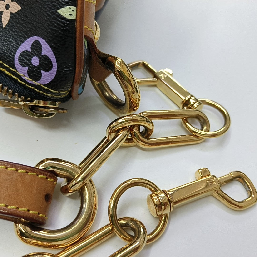 LV × TM RITA Monogram Coated Canvas Black