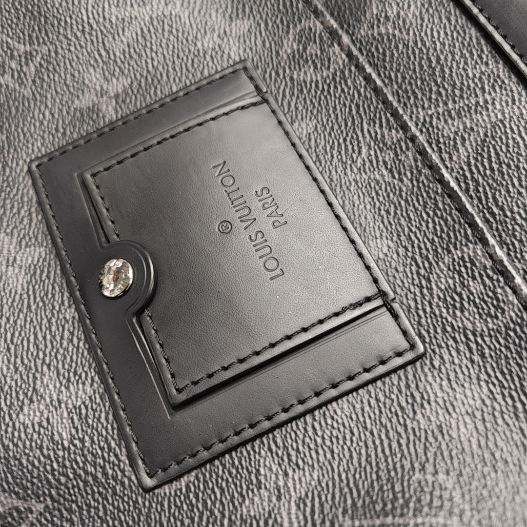 VOYAGER PM Monogram Coated Canvas Black