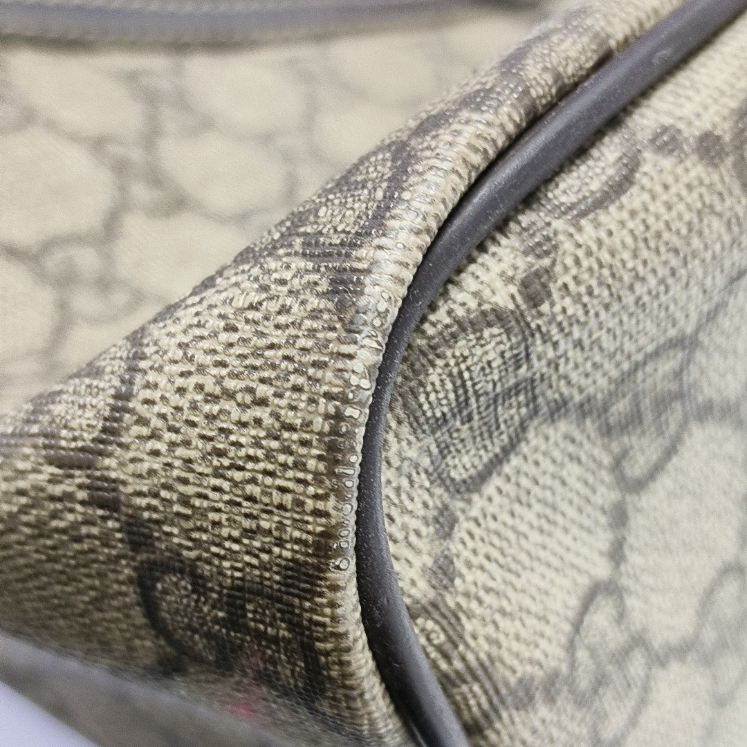 Monogram Coated Canvas Top Handle Bag Brown