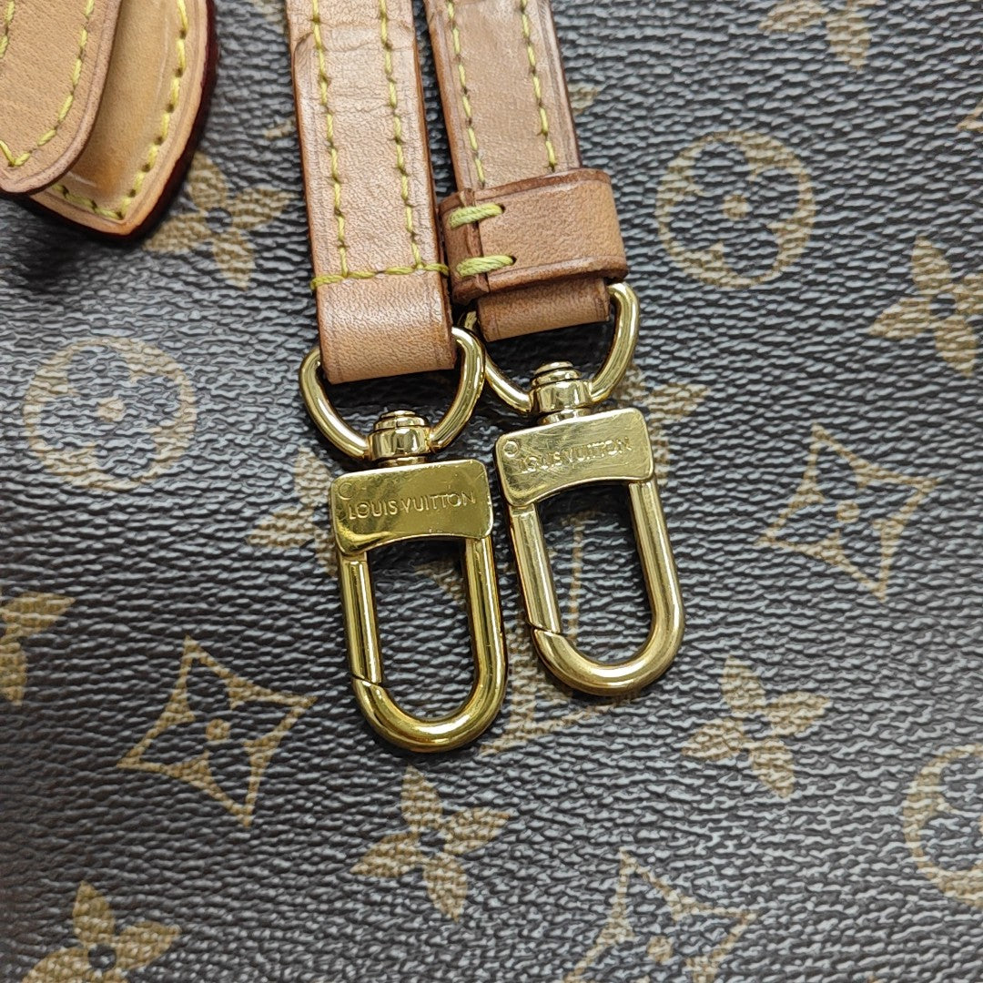 RIVOLI MM Monogram Coated Canvas Brown