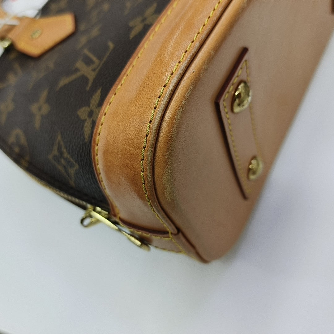 ALMA BB Monogram Coated Canvas Brown