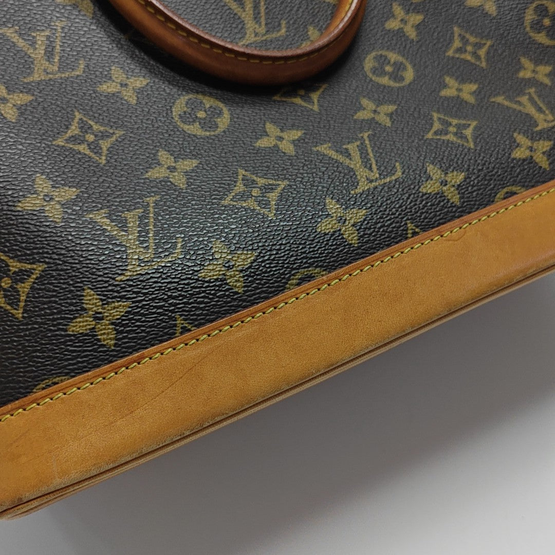 ALMA PM Monogram Coated Canvas Brown