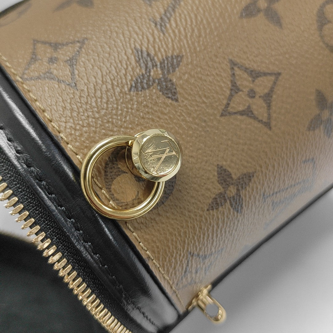 CANNES PM Monogram Coated Canvas Brown