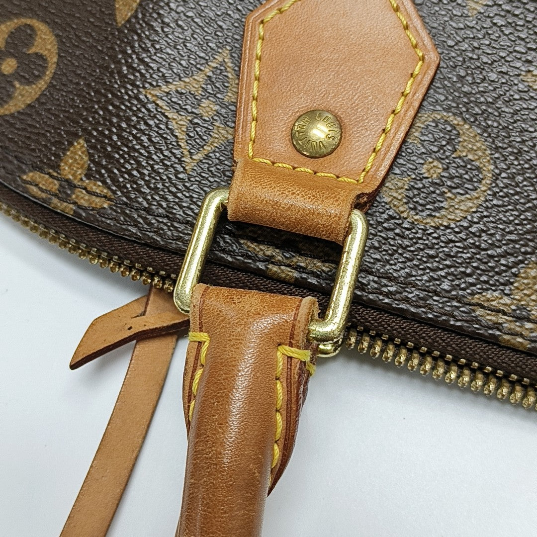 ALMA GM Monogram Coated Canvas Brown