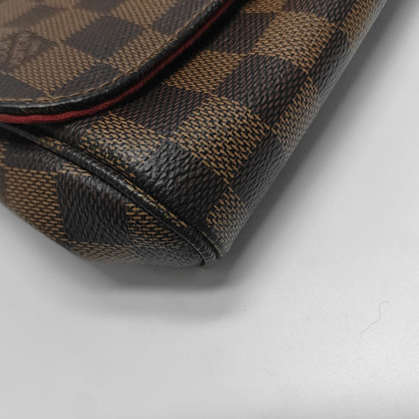 FAVORITE PM Damier Ebene Coated Canvas Brown