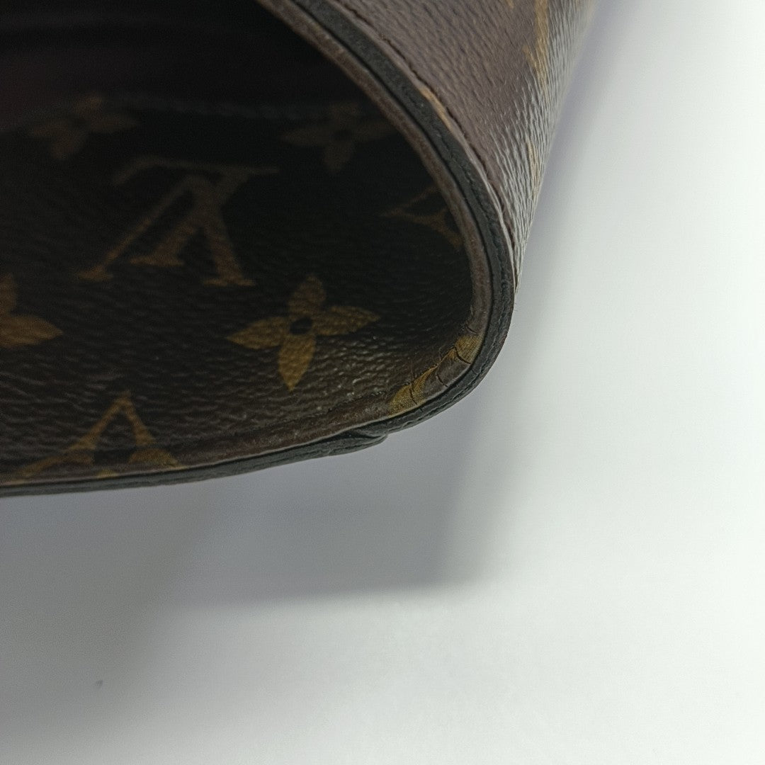 MONTAIGNE GM Monogram Coated Canvas Brown