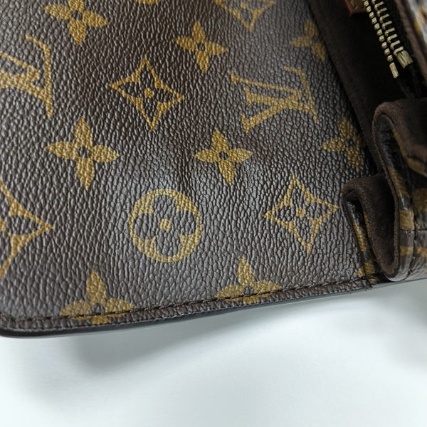 MÉTIS EAST WEST Monogram Coated Canvas Brown