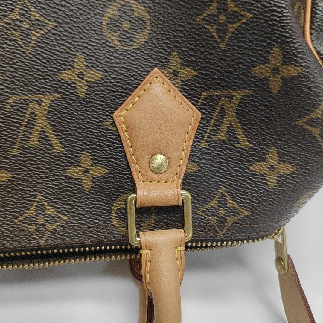 SPEEDY 25 Monogram Coated Canvas Brown