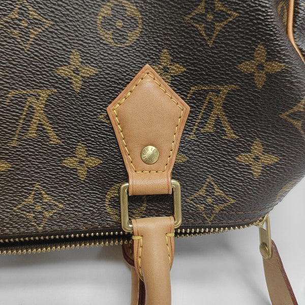 SPEEDY 25 Monogram Coated Canvas Brown