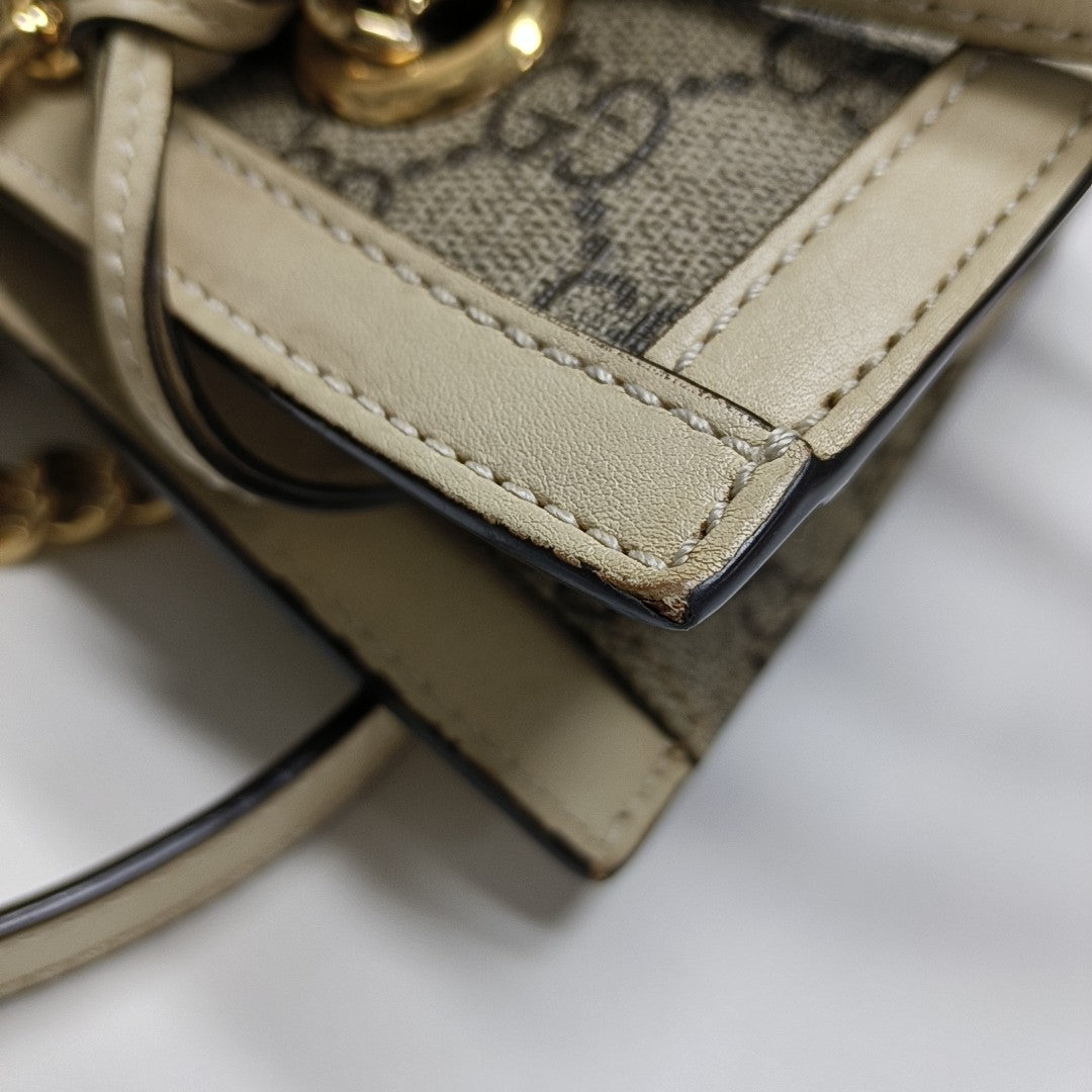 Padlock Small Monogram Coated Canvas Beige