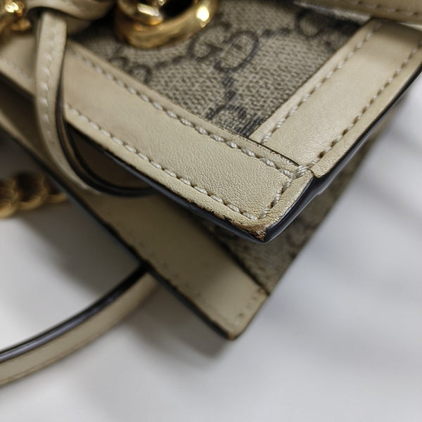Padlock Small Monogram Coated Canvas Beige