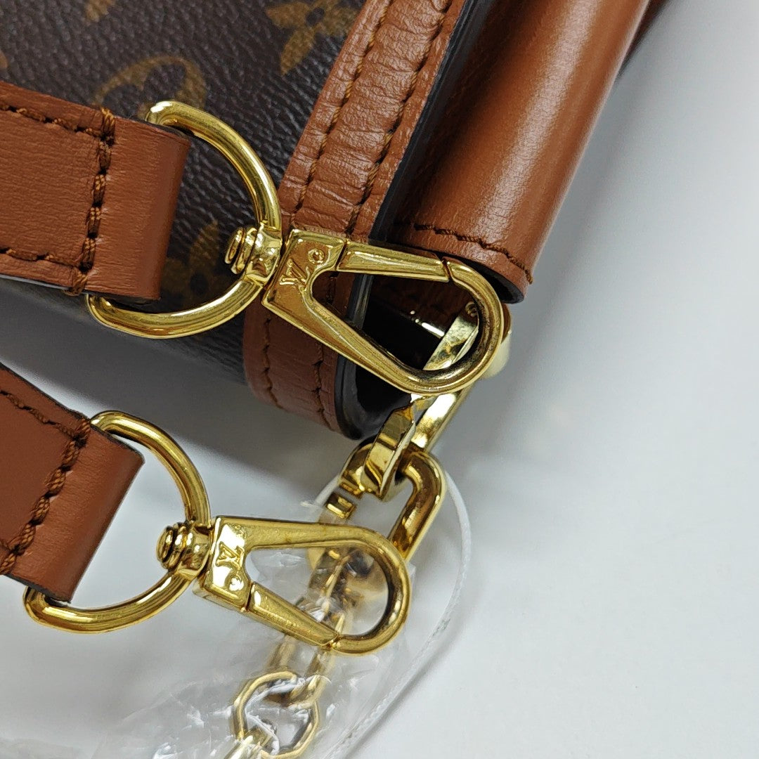 DAUPHINE MM Monogram Coated Canvas Brown