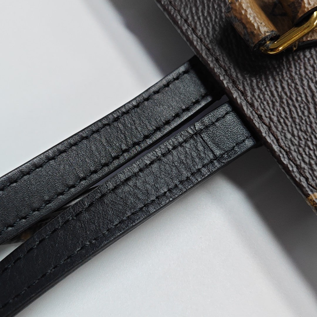 ONTHEGO MM Monogram Coated Canvas Brown