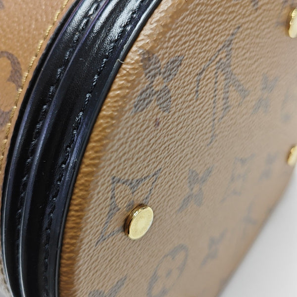 CANNES PM Monogram Coated Canvas Brown