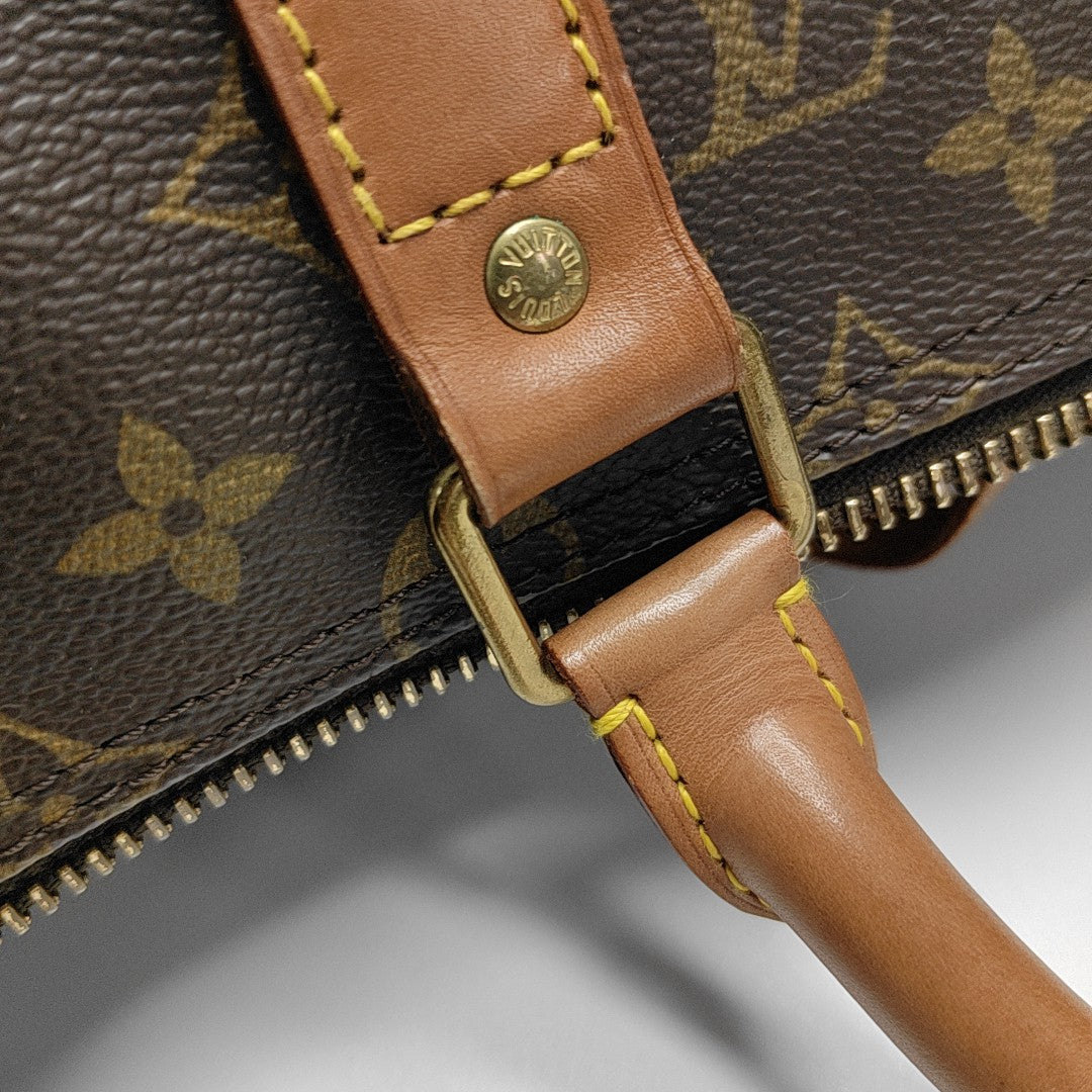 KEEPALL 60 Monogram Coated Canvas Brown