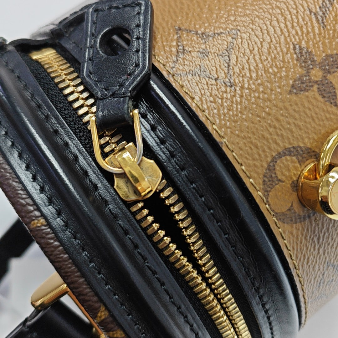 CANNES PM Monogram Coated Canvas Brown