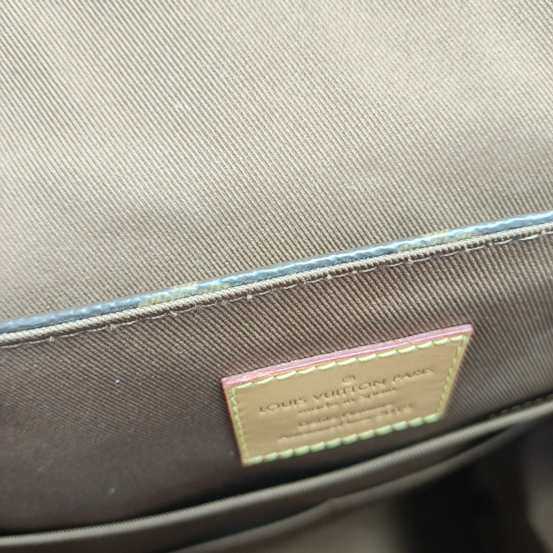 TRIO Monogram Coated Canvas Brown