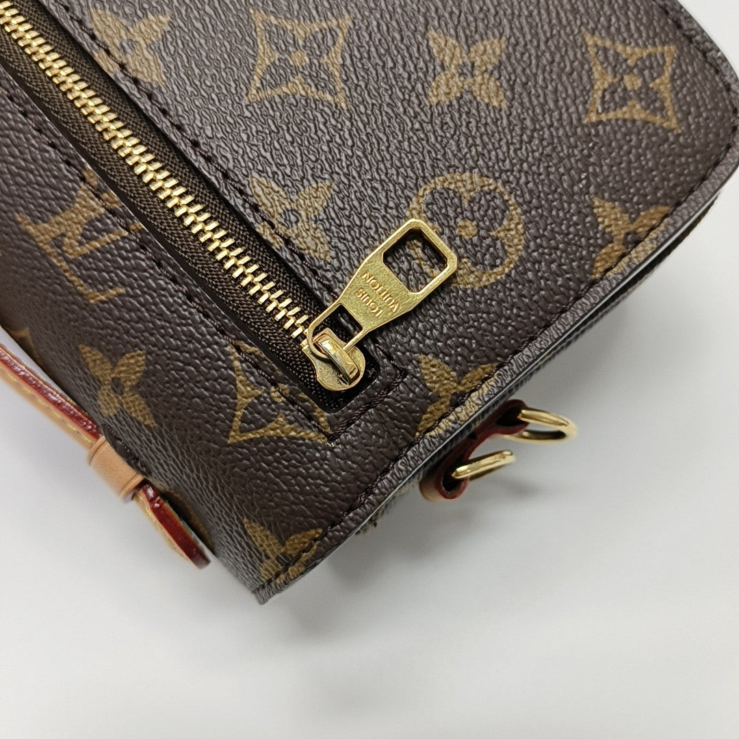 MÉTIS EAST WEST Monogram Coated Canvas Brown