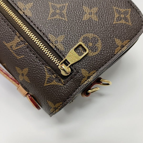 MÉTIS EAST WEST Monogram Coated Canvas Brown