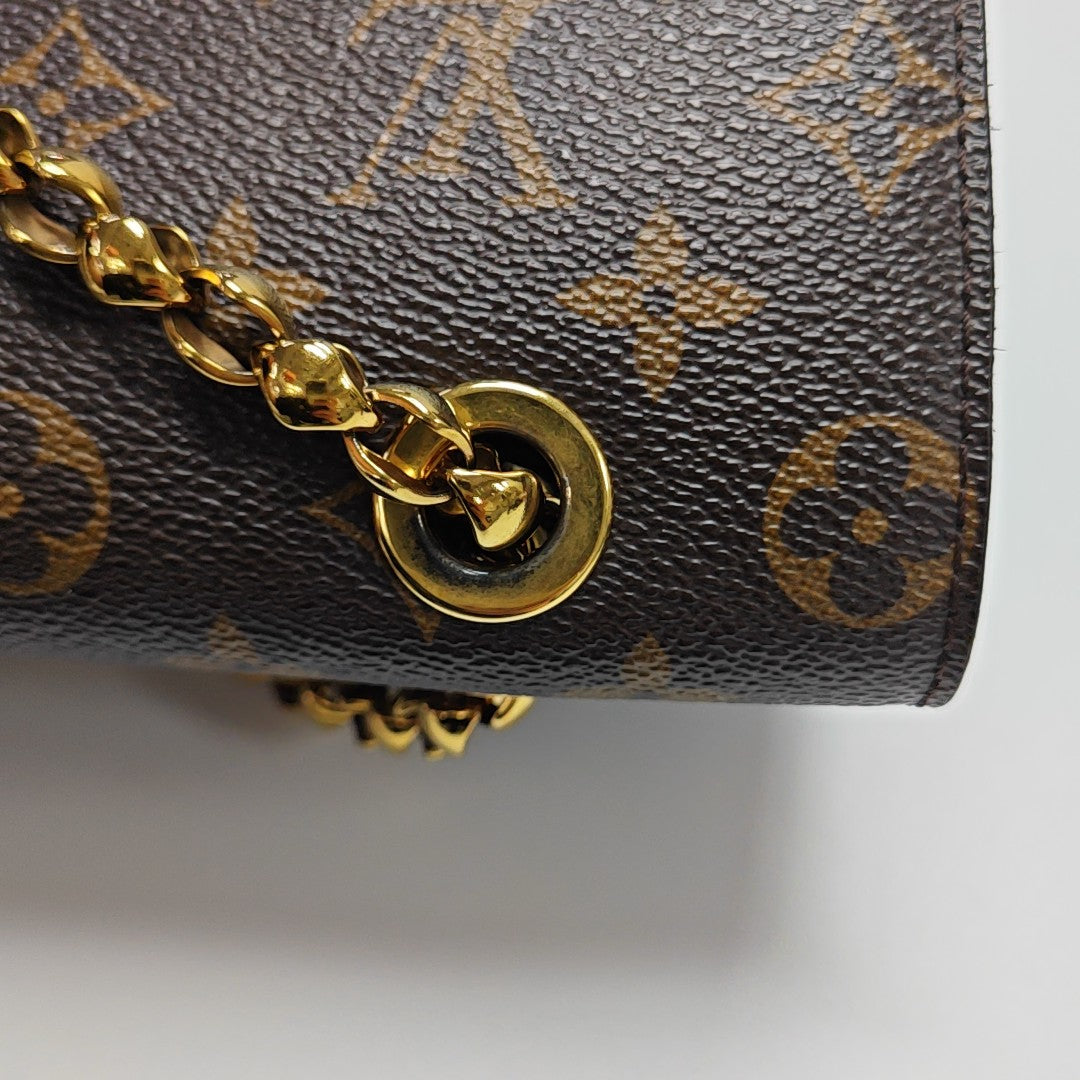 VICTOIRE Monogram Coated Canvas Brown