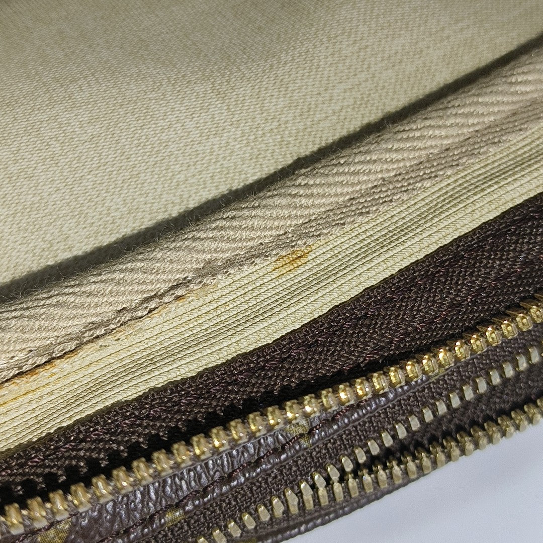 REPORTER GM Monogram Coated Canvas Brown