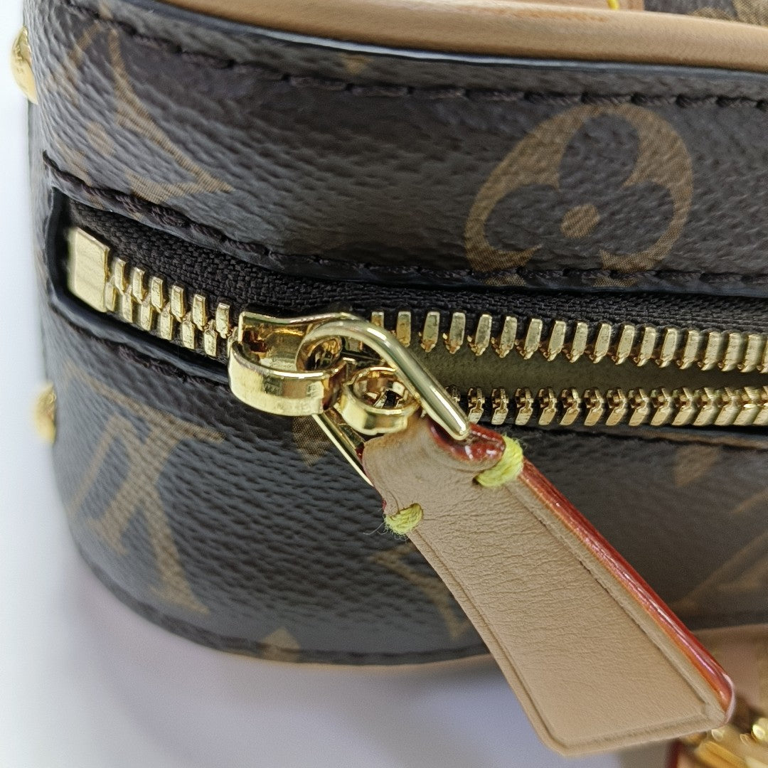 LUGGAGE Monogram Coated Canvas Brown