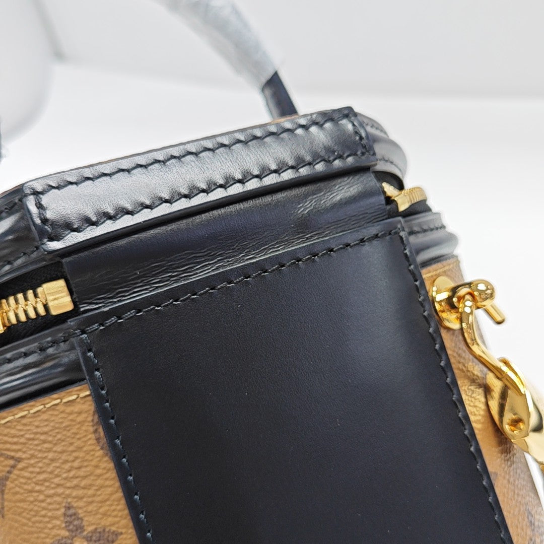 CANNES PM Monogram Coated Canvas Brown