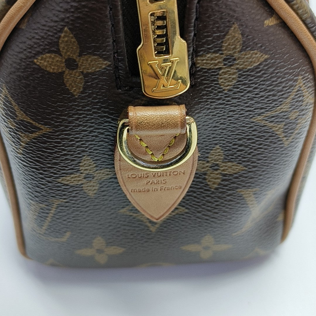 SPEEDY 20 Monogram Coated Canvas Brown