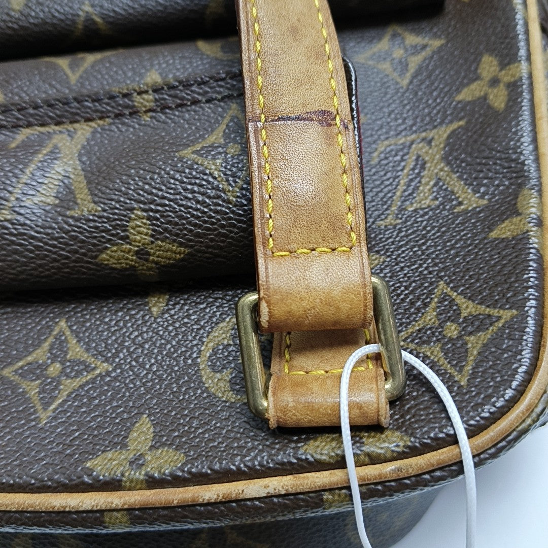 EXCENTRI-CITE Monogram Coated Canvas Brown