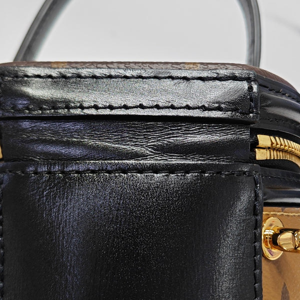 CANNES PM Monogram Coated Canvas Brown