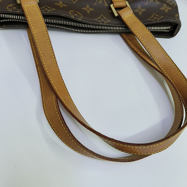 PIANO Monogram Coated Canvas Brown