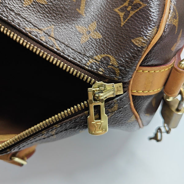SPEEDY 35 Monogram Coated Canvas Brown