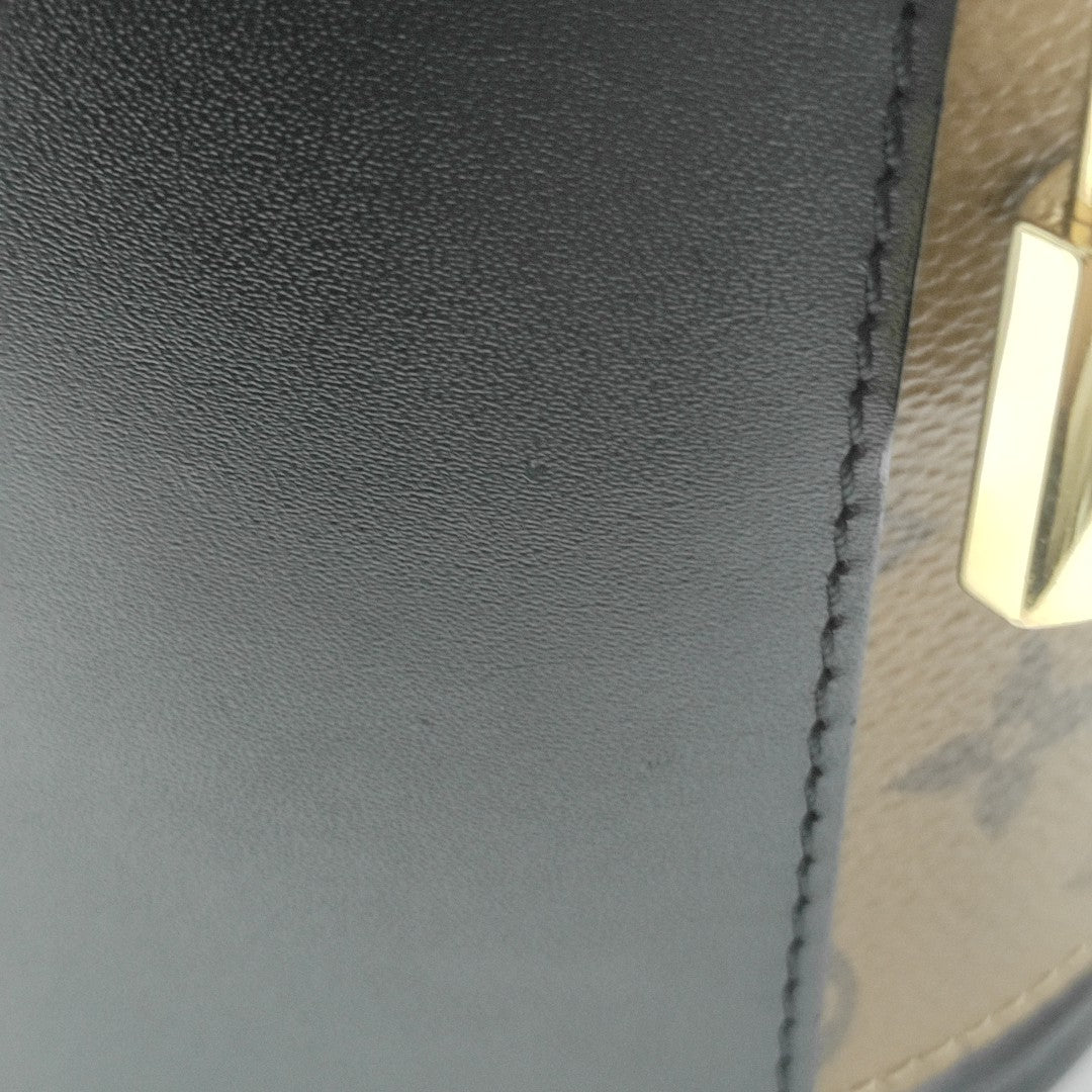 CANNES PM Monogram Coated Canvas Brown