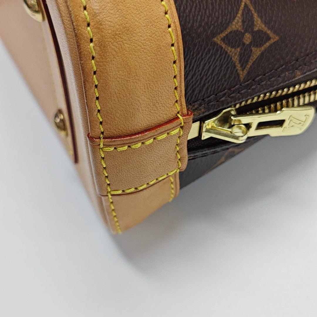 ALMA BB Monogram Coated Canvas Brown