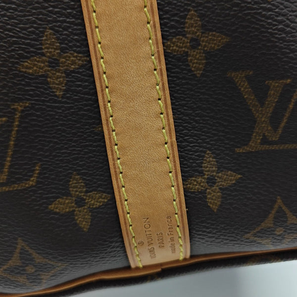 SPEEDY 25 Monogram Coated Canvas Brown