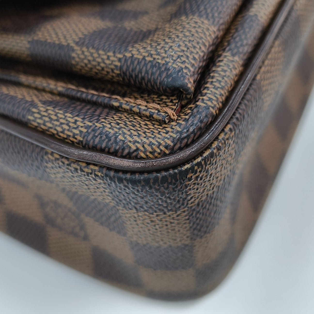 RAVELLO GM Damier Ebene Coated Canvas Brown