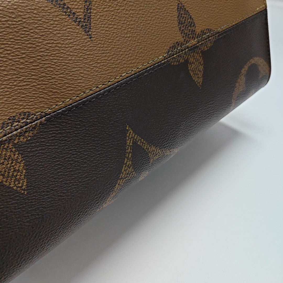 ONTHEGO MM Monogram Coated Canvas Brown