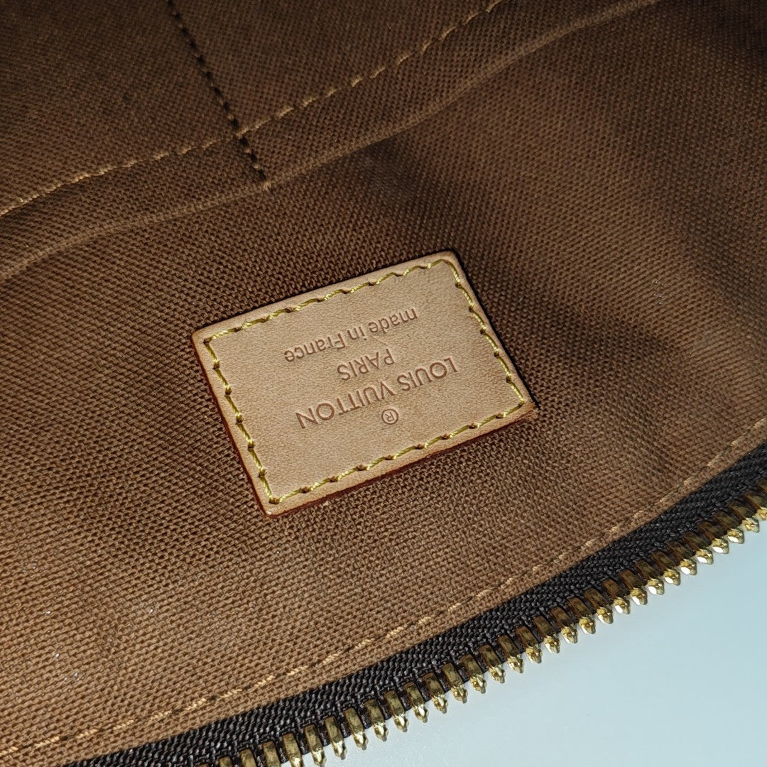 Monogram Coated Canvas Top Handle Bag Brown