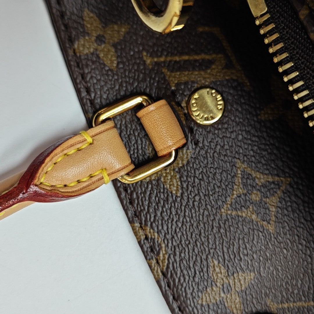 MONTAIGNE Monogram Coated Canvas Brown
