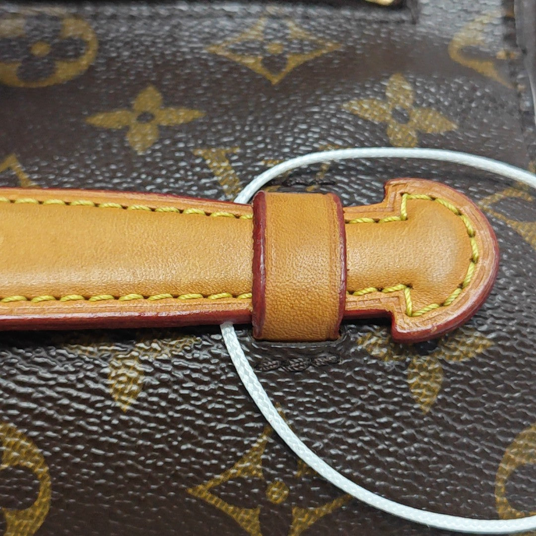 MÉTIS MM Monogram Coated Canvas Brown