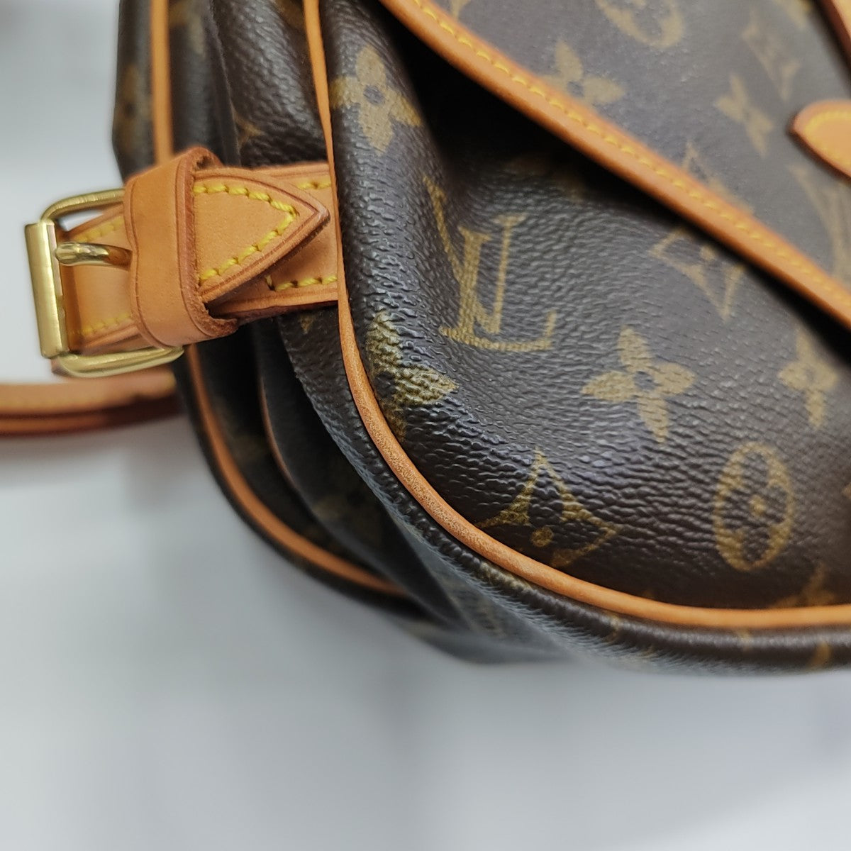 SAUMUR Monogram Coated Canvas Brown
