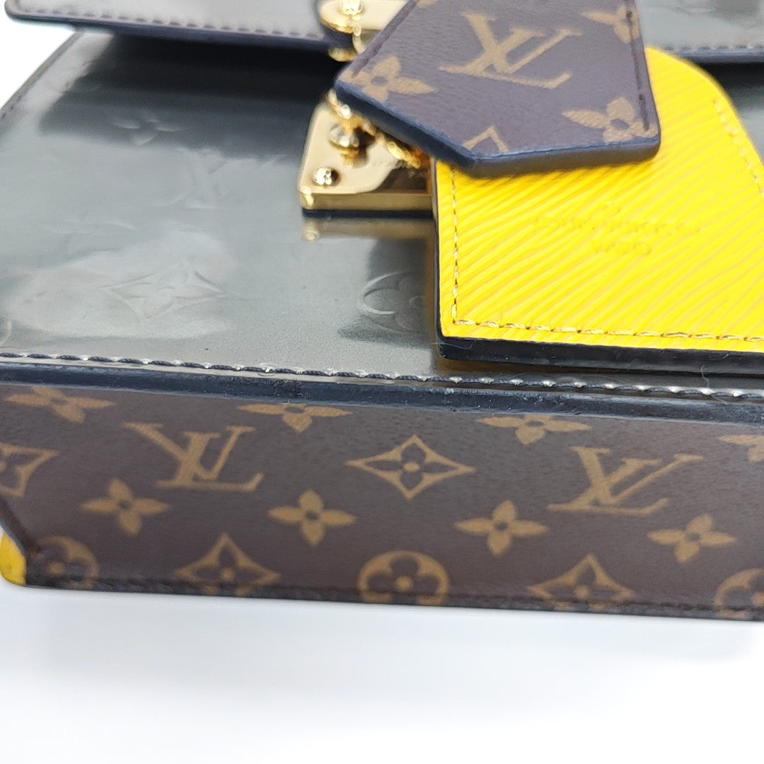 SPRING STREET Monogram Patent Leather Silver