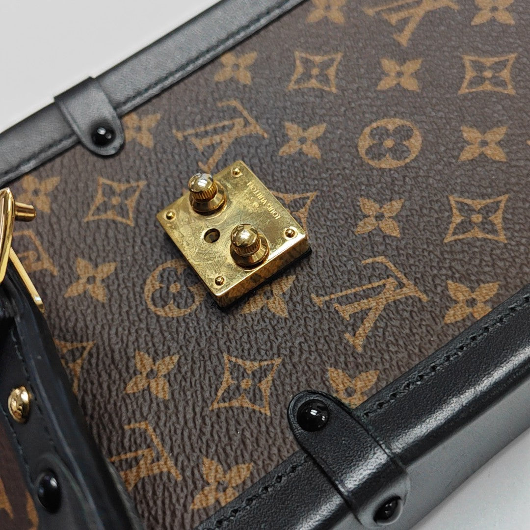 TRUNK Monogram Coated Canvas Brown