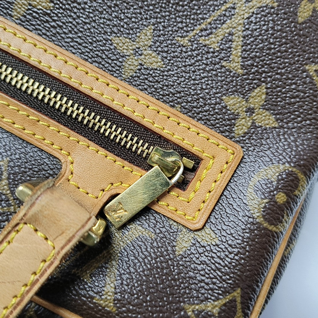 CITE MM Monogram Coated Canvas Brown